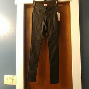 Black skinny moto jeans